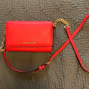 Michael Kors coral crossbody.